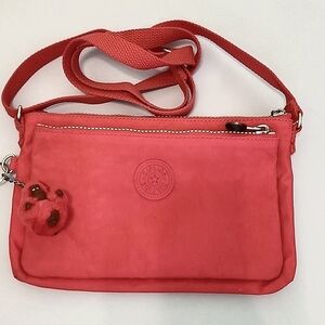 Used Kipling pink crossbody with gorilla‎